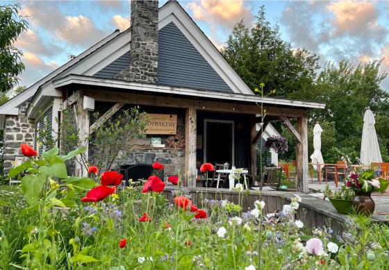 Brot Bakehouse bakery as seen from their flower-filled front lawn