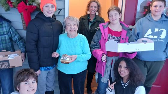 Students at Brighton Elementary deliver meals to senior residents at Sunrise Manor in Island Pond